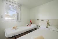 Posteľ alebo postele v izbe v ubytovaní Salve Croatia Mobile Homes in Amadria Park Trogir