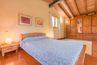 Łóżko lub łóżka w pokoju w obiekcie Villa Luisa by Sealand Villas