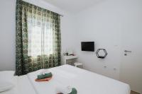 Posteľ alebo postele v izbe v ubytovaní HOUSE MARIJA DRVENIK MALI