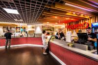 people standing at the counter of a fast food restaurant at Circus Circus Reno, A Caesars Destination in Reno