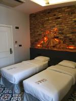 A bed or beds in a room at A Plus Residence