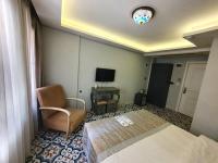 A television and/or entertainment centre at A Plus Residence
