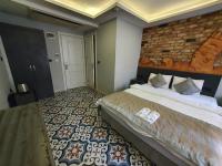 A bed or beds in a room at A Plus Residence