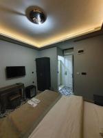 A bed or beds in a room at A Plus Residence