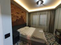 A bed or beds in a room at A Plus Residence