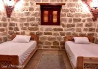 Postel nebo postele na pokoji v ubytování Zad Elmosafer Villa - Tunis Village