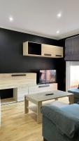 A bed or beds in a room at PiyMargall2 By Vigovacaciones