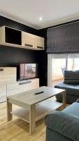 A seating area at PiyMargall2 By Vigovacaciones