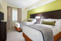 Staybridge Suites - Miami International Airport by IHGにあるベッド