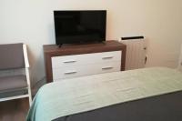 A television and/or entertainment centre at Casa Corredoira