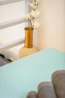 A bed or beds in a room at DS Traditional Villas Santorini Island