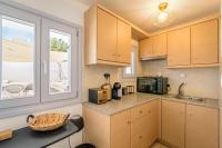 A kitchen or kitchenette at DS Traditional Villas Santorini Island