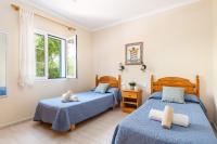 Postel nebo postele na pokoji v ubytování Villa Gabriel Son Parc by Villa Plus