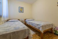 Postel nebo postele na pokoji v ubytování HRUSTA