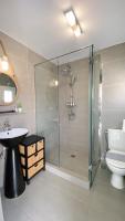 Kúpeľňa v ubytovaní Amperian Mykonos Suites & Villas