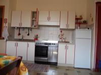 A kitchen or kitchenette at Villa Magnolia Appartamenti