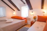 Posteľ alebo postele v izbe v ubytovaní Split Inn Apartments