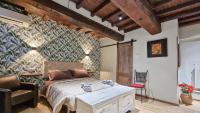 Posteľ alebo postele v izbe v ubytovaní Residenza dei Longobardi Affittacamere