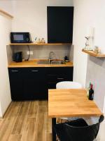 Kuchyňa alebo kuchynka v ubytovaní Apartmán Ginko I