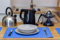Příslušenství pro přípravu čaje a kávy v ubytování Navy style friendly Holiday Home