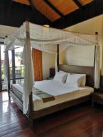 Postel nebo postele na pokoji v ubytování Kao Tao Villa Beach Resort-Hua Hin