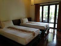 Postel nebo postele na pokoji v ubytování Kao Tao Villa Beach Resort-Hua Hin