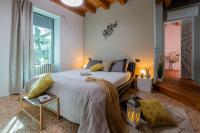 Posteľ alebo postele v izbe v ubytovaní La Perla di Costozza - Exclusive Wellness & Spa