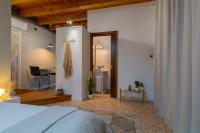 Posteľ alebo postele v izbe v ubytovaní La Perla di Costozza - Exclusive Wellness & Spa