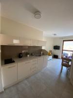 Kuchyň nebo kuchyňský kout v ubytování Apartament Jastarnia