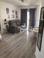 A seating area at APARTAMENTO SOL Y PLAYA