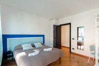 Posteľ alebo postele v izbe v ubytovaní Dock of the Bay Genova, Stylish Apartment in the Heart of Genoa with Air Conditioning, Private free Garage, Harbour View