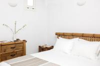 Postel nebo postele na pokoji v ubytování Villa Eirene Agl Psarrou Mykonos