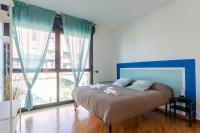 Posteľ alebo postele v izbe v ubytovaní Dock of the Bay Genova, Stylish Apartment in the Heart of Genoa with Air Conditioning, Private free Garage, Harbour View