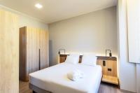Posteľ alebo postele v izbe v ubytovaní Palazzo Le Poste - Suite and Apartments