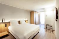 Posteľ alebo postele v izbe v ubytovaní Palazzo Le Poste - Suite and Apartments