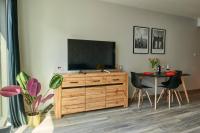 Televízia a/alebo spoločenská miestnosť v ubytovaní EASY RENT Apartments - Crystal