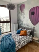 Posteľ alebo postele v izbe v ubytovaní Apartamenty Wola Goleszowska