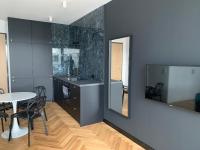 Kuchyňa alebo kuchynka v ubytovaní Apartamenty Wola Goleszowska