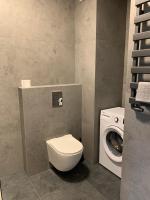 Kúpeľňa v ubytovaní Apartamenty Wola Goleszowska