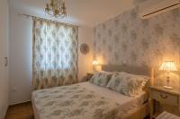 Posteľ alebo postele v izbe v ubytovaní MARIOS VILLAS