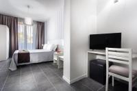 A bed or beds in a room at Hotel Star