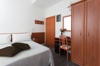 A bed or beds in a room at Hotel Star