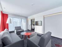 Televízia a/alebo spoločenská miestnosť v ubytovaní ibis Styles Nowy Targ