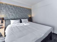 Posteľ alebo postele v izbe v ubytovaní ibis Styles Nowy Targ