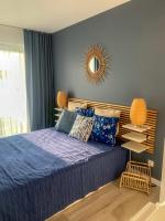 Posteľ alebo postele v izbe v ubytovaní La Riva Mia Apartamenty