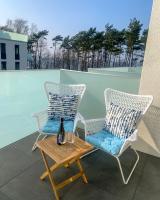 Bazén v ubytovaní La Riva Mia Apartamenty alebo v jeho blízkosti