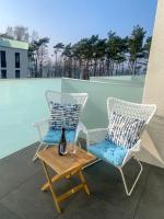 Bazén v ubytovaní La Riva Mia Apartamenty alebo v jeho blízkosti