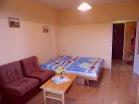A bed or beds in a room at Apartmán Zdravie Horný Smokovec