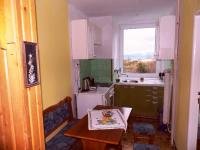 A kitchen or kitchenette at Apartmán Zdravie Horný Smokovec