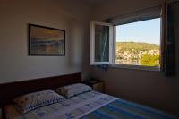 Posteľ alebo postele v izbe v ubytovaní Žigulin Apartment